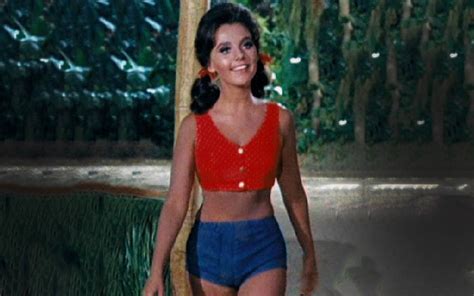 American actress Dawn Wells, in character as Mary Ann, wears a bikini ...